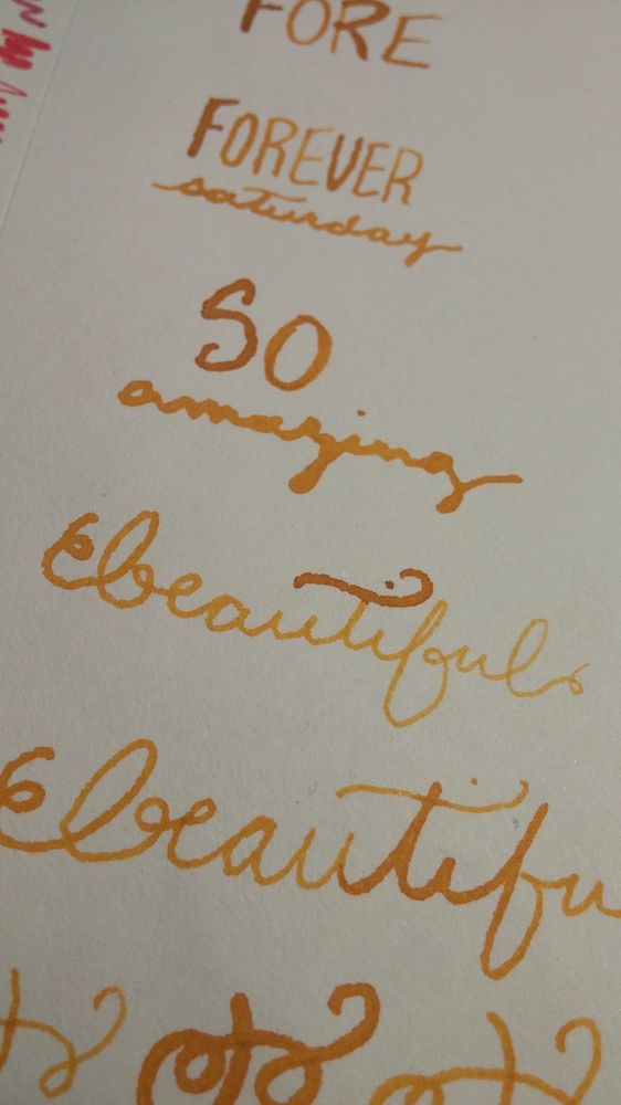 Lettering in gold ink